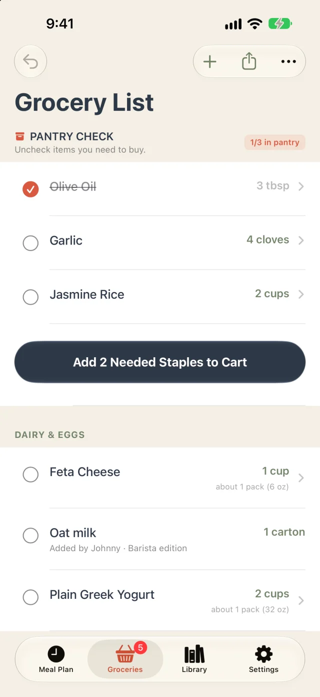 The grocery list: a pantry check with olive oil ticked as already at home, then feta and yogurt with how many packs to buy, and oat milk added by a family member.